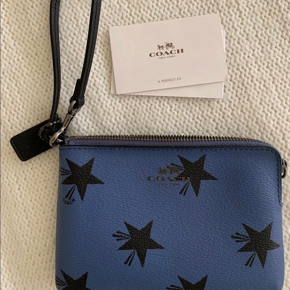 Star printed Coach wristlet. - Picture 1 of 3